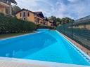 trilocale-con-giardino-piscina-taverna-e-box