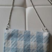 Borsa piatta con tracolla in pied de poule