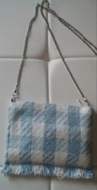 Borsa piatta con tracolla in pied de poule