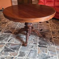 Tavolo rotondo in legno massello con base intaglia