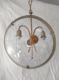 Lampadario bifacciale in metallo e vetro 