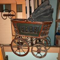 Bambola con carrozzina