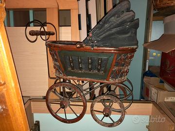 Bambola con carrozzina