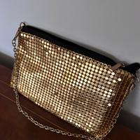 Pochette dorata e nera