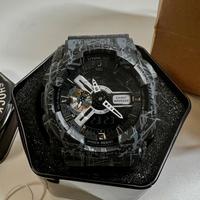Casio G-Shock GA-100CM-8AER camouflage grigio