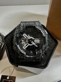 Casio G-Shock GA-100CM-8AER camouflage grigio
