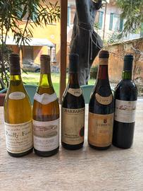 cinque bottiglie di vino d'annata