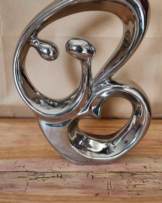 scultura in ceramica in smalto 