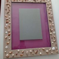 cornice con conchiglie