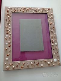 cornice con conchiglie