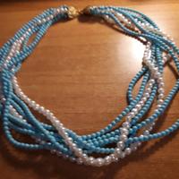 collana perline bianche e azzurre e orologio donna