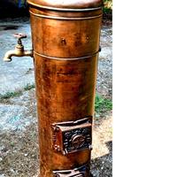 Antico scaldabagno in rame