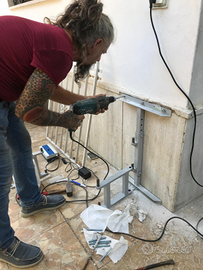 sollevatore gruetta a muro per disabili sfilabile