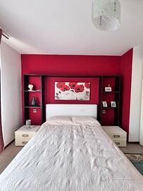 Camera da letto bianco lucido