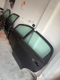 4 portiere complete per  fiat grande punto
