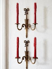 Coppia di candelabri da parete
