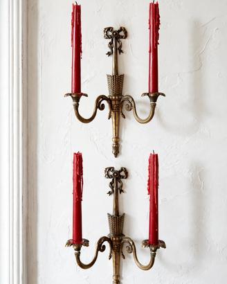 Coppia di candelabri da parete
