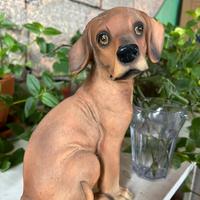 Statua cane a salvadanaio