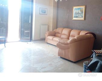 Divsno in pelle ad angolo