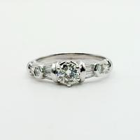 Anello oro 18 kt diamante ct.0.45 e baguette