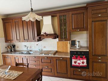 cucina più arredamento da solotto