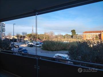 Elegante trilocale con posto auto e doppi servizi