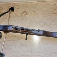 Balestra in legno intarsiato  - ornamento