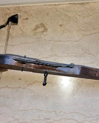 Balestra in legno intarsiato  - ornamento