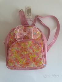 Zainetto bambina rosa con paillettes e fiocco