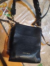 Borsa Coccinelle bohème small verticale in pelle.