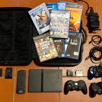 Playstation 2 Slim + 11 Giochi + 4 Controller