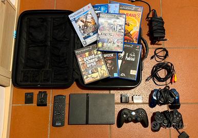 Playstation 2 Slim + 11 Giochi + 4 Controller
