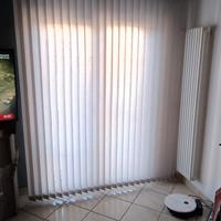 tenda a barre verticali