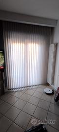 tenda a barre verticali