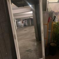 Specchio con cornice lavorata