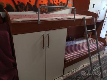 Tre letti a castello+armadi