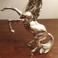 SCULTURA LAMINATA IN ARGENTO