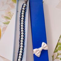 Bracciale artigianale blu notte con perle 