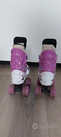 Pattini a rotelle bimba rosa e bianchi n.28-31