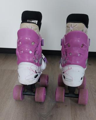 Pattini a rotelle bimba rosa e bianchi n.28-31