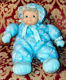 Bambola doudou morbida con testa in vinile ceppira