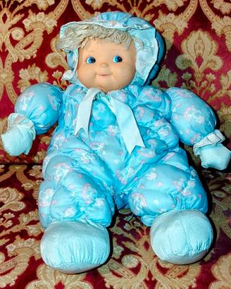 Bambola doudou morbida con testa in vinile ceppira