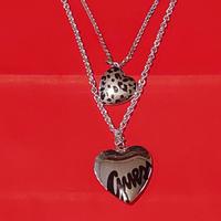 Guess - Collana con ciondoli a cuore