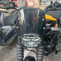 Cupolino e griglia faro per Royal Enfield