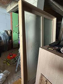 Porta scorrevole con vetro