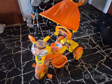 Triciclo per bambini con parasole