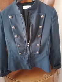 Giacca blu e giacca verde senza maniche