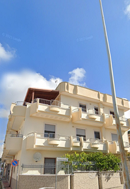 Elegante e spaziosa abitazione con veranda