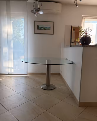 Tavolo rotono  sagomato Snaidero
