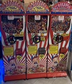 Tre pezzi distributore palline e chupa chups